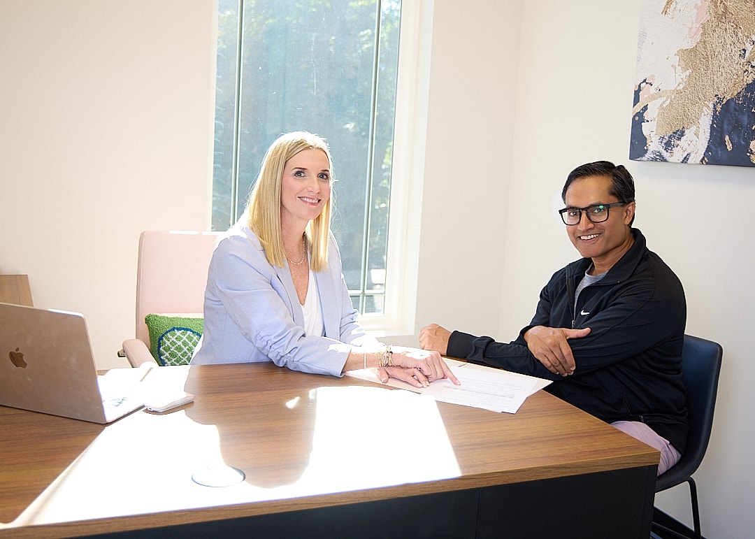 Woman's face with light and shadow patterns.