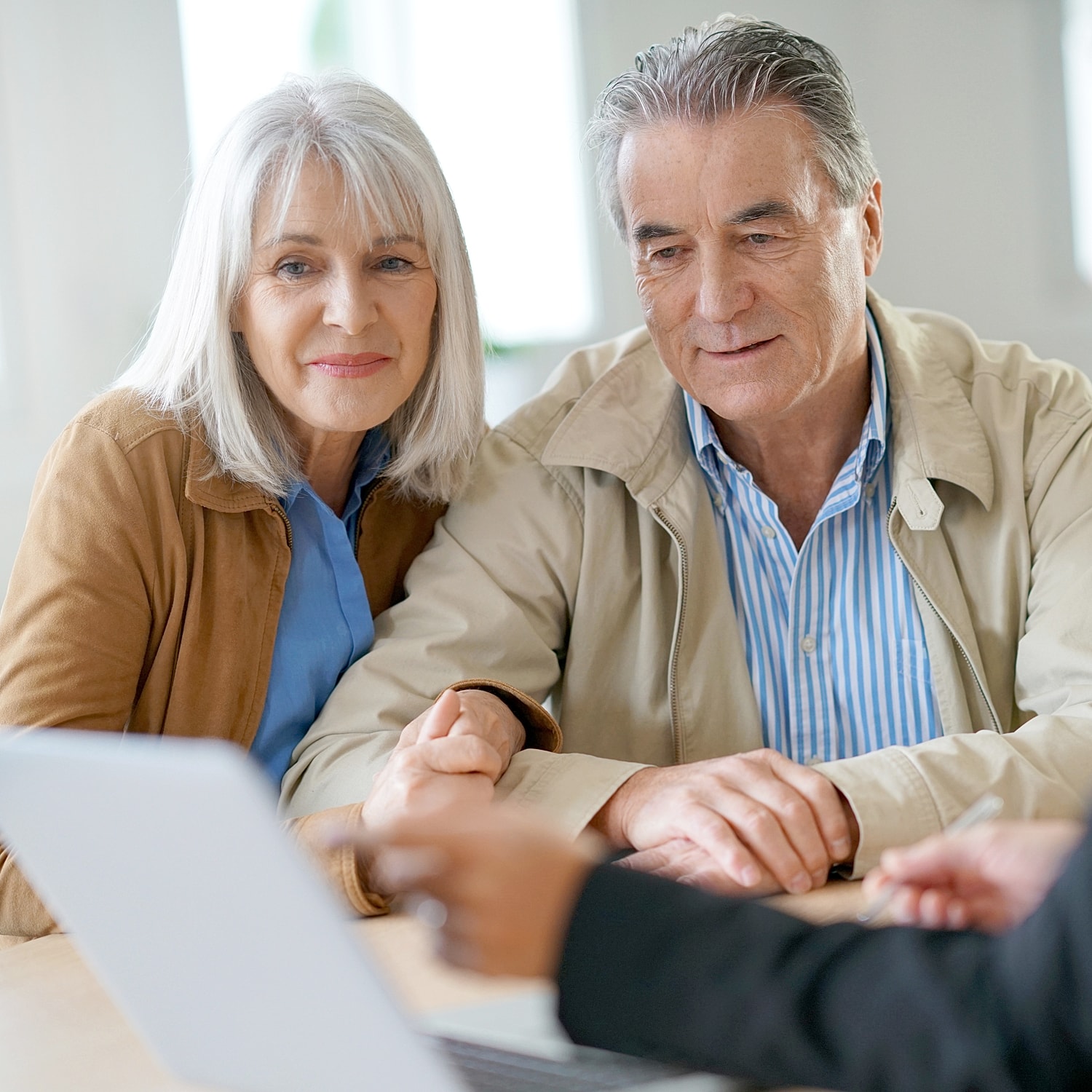 Happy couple enjoying a playful moment together.